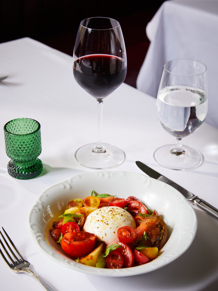 Principessa Ristorante burrata caprese with tomatoes and wine